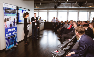 Birte Gall, Managing Director of the Berlin School of Digital Business, and Gregor Puchalla, Managing Director of FinTechCube, welcome those attending Digital Finance Berlin.