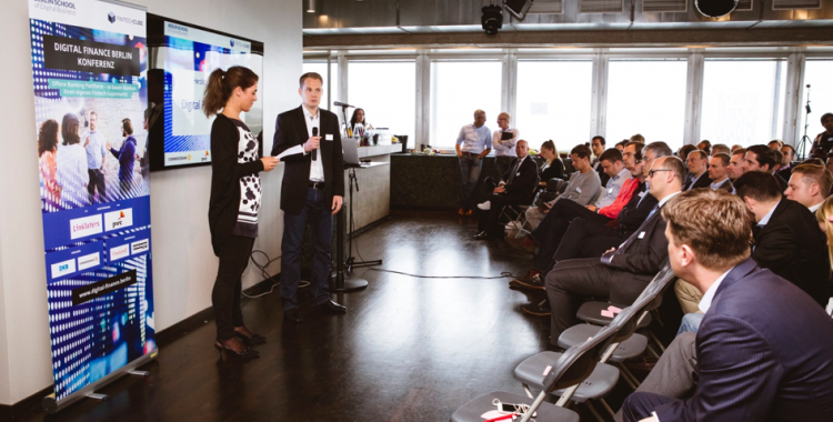 Birte Gall, Managing Director of the Berlin School of Digital Business, and Gregor Puchalla, Managing Director of FinTechCube, welcome those attending Digital Finance Berlin.